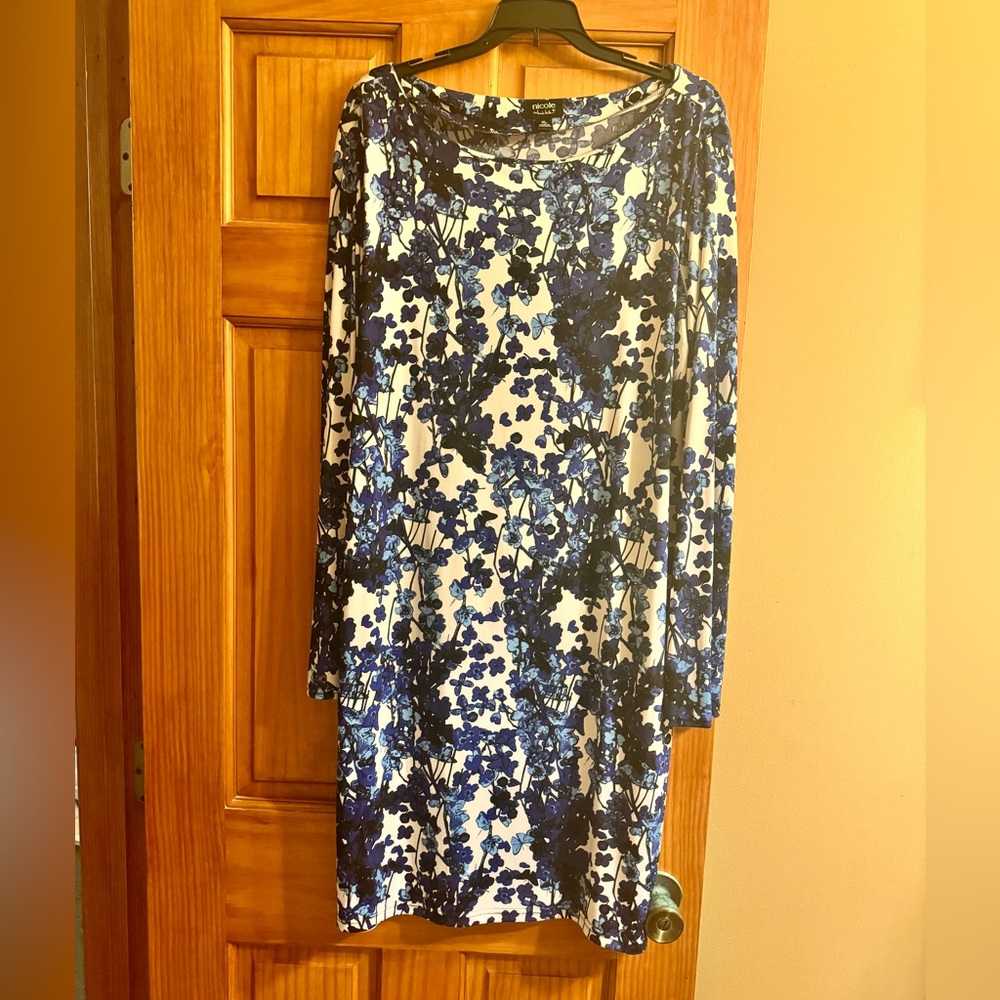 Beautiful flowered dress with subtle butterflies in pattern.